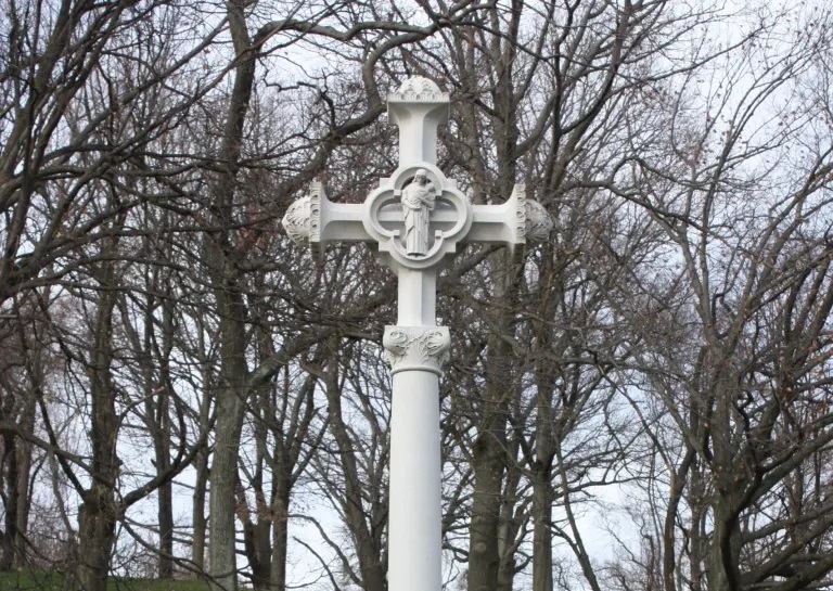 French Cross at Cypress Hills National Cemetery in Brooklyn, New York. The granite monument was installed at the burial site of the 25 French sailors who died from influenza during a port call at the end of World War I. (National Cemetery Administration)