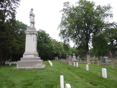 Burial area and Union Soldiers' monument at Mound City Cemetery Soldiers' Lot in Mound City, Kan.