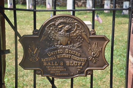 Historic plaque on the gate at Balls Bluff National Cemetery.