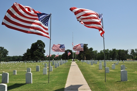 Colors wave on Flag Day at Fort Gibson National Cemetery.