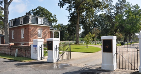 Entrance gate and lodge at Port Hudson National Cemetery.