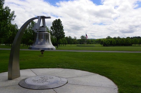 Ship's bell from the USS Saratoga at Gerald BH Solomon Saratoga National Cemetery.