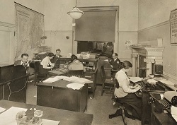They could be blogging! World War I staff of the American Protective League, 1917-1918, working at desks, typing. War Department. Photograph 7 January 1919. NARA.
